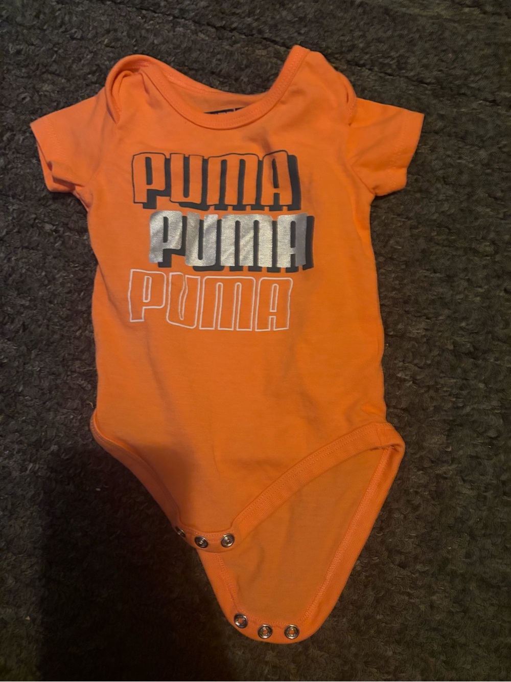 Puma puma puma baby onesie.